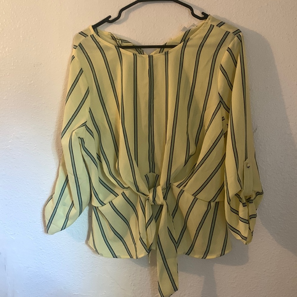 Size large blue and yellow top. New with tags.